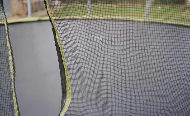 black netting surrounding trampoline