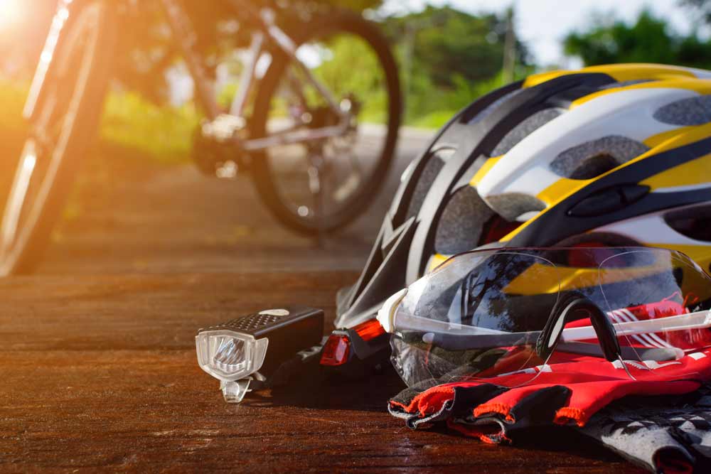 bicycle helmet and equipment on ground