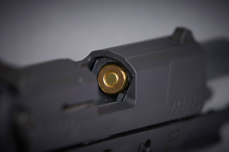 bullet in chamber of handgun