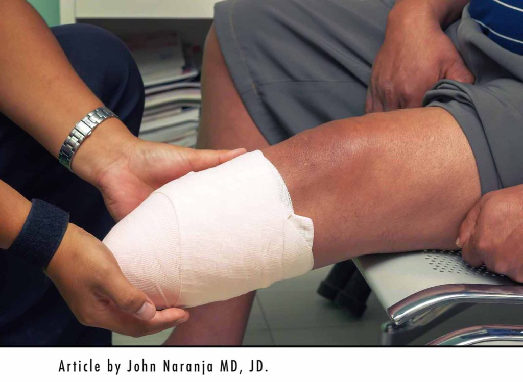 doctor teaching wound care for healing prior to prosthetic attachment