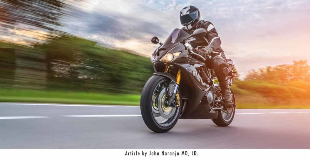 motorcycle rider driving on the open road