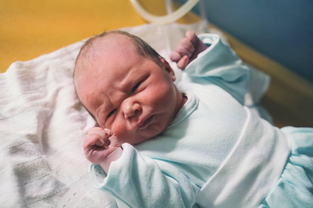 newborn baby after delivery in labor room