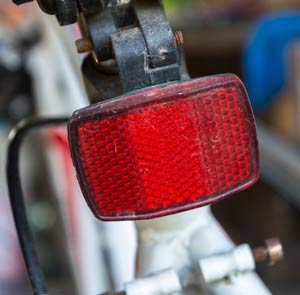 rear reflector attached to bicycle to make bicycle stand out