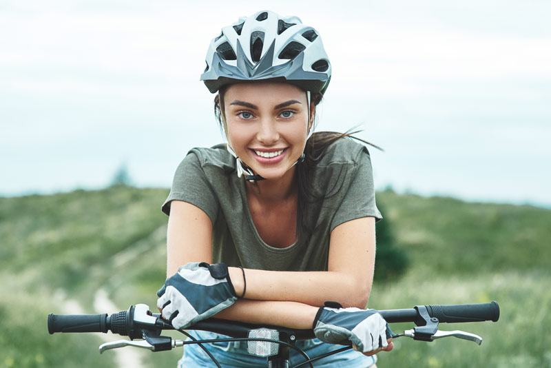 bicycle rider wearing helmet, the most important safety gear