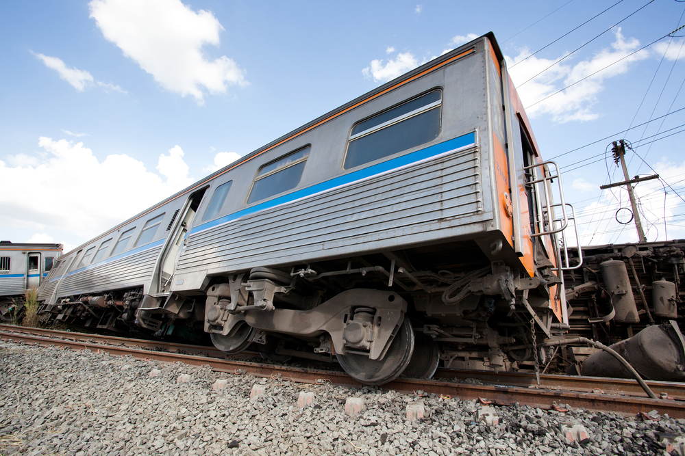 Derailed train car off the tracks