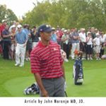 tiger woods at golf tournament - by john naranja