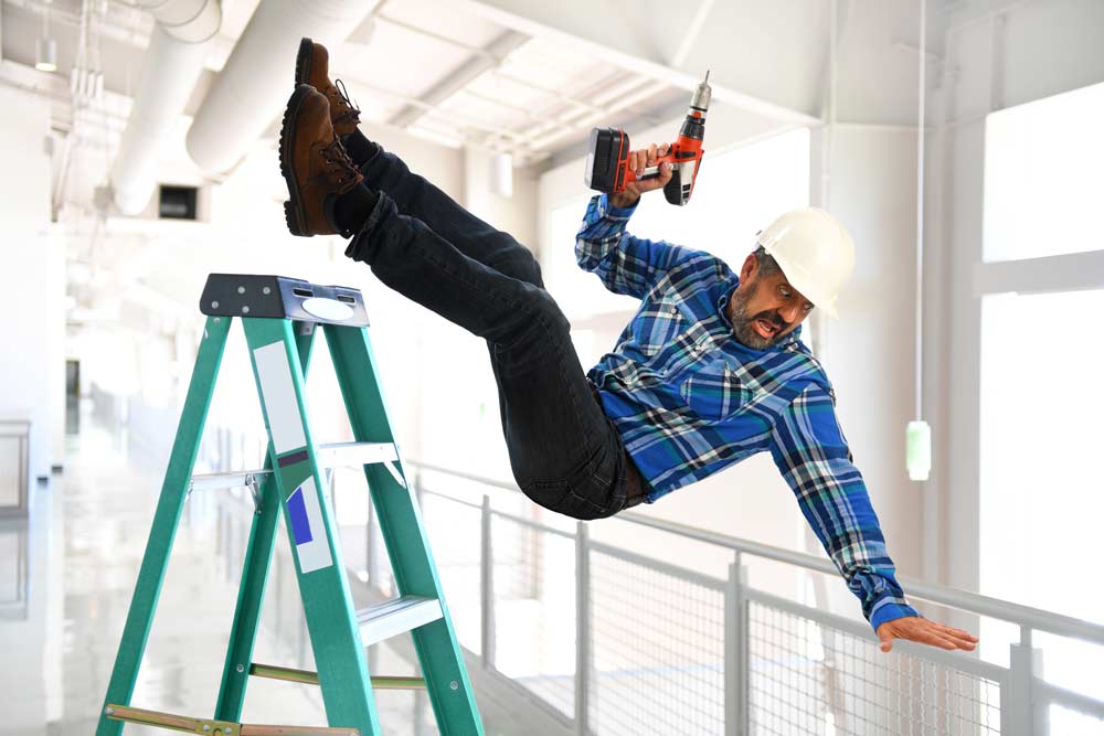 construction worker falling from ladder